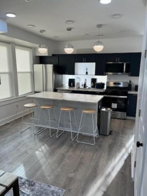 Entire detached home 4 bedrooms 3 bath free parking with deck
